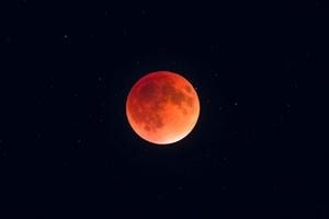 A Super Harvest Blood Moon and Partial Lunar Eclipse Are Coming Tuesday