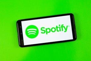Spotify Quietly Starts Charging Non-Premium Listeners for Lyrics     - CNET